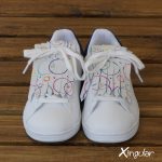 flecos zapatillas circulos pintados juntos